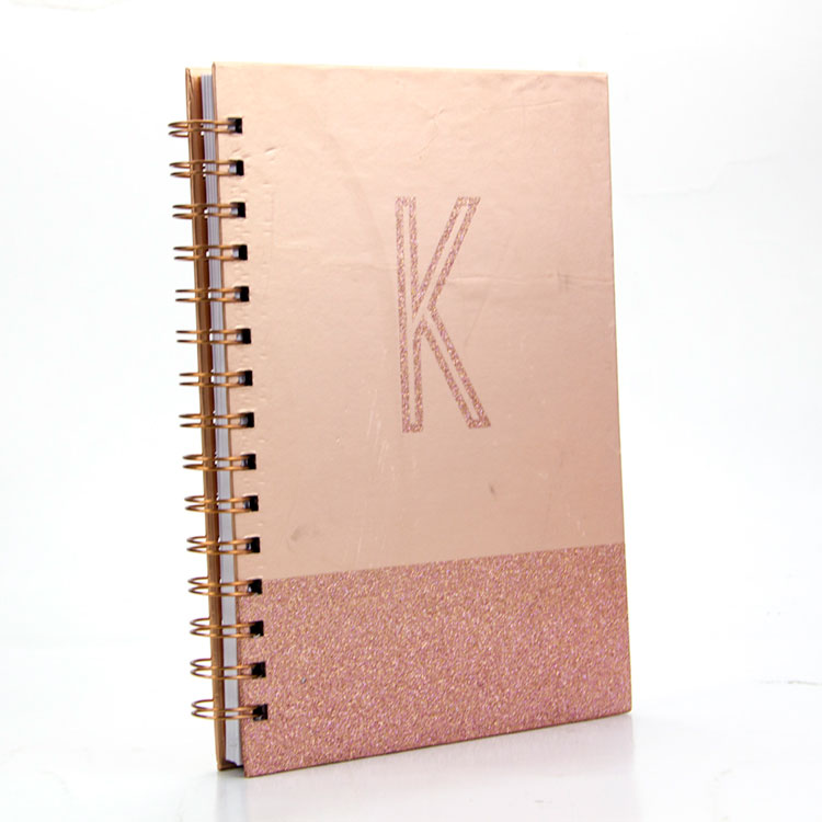 Fábrica de cuadernos de espiral de oro
